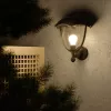 Настенный фонарь уличный Aura GD027 - фото в интерьере (миниатюра)